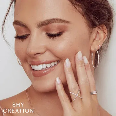 0.18ctw Diamond "X" Ring