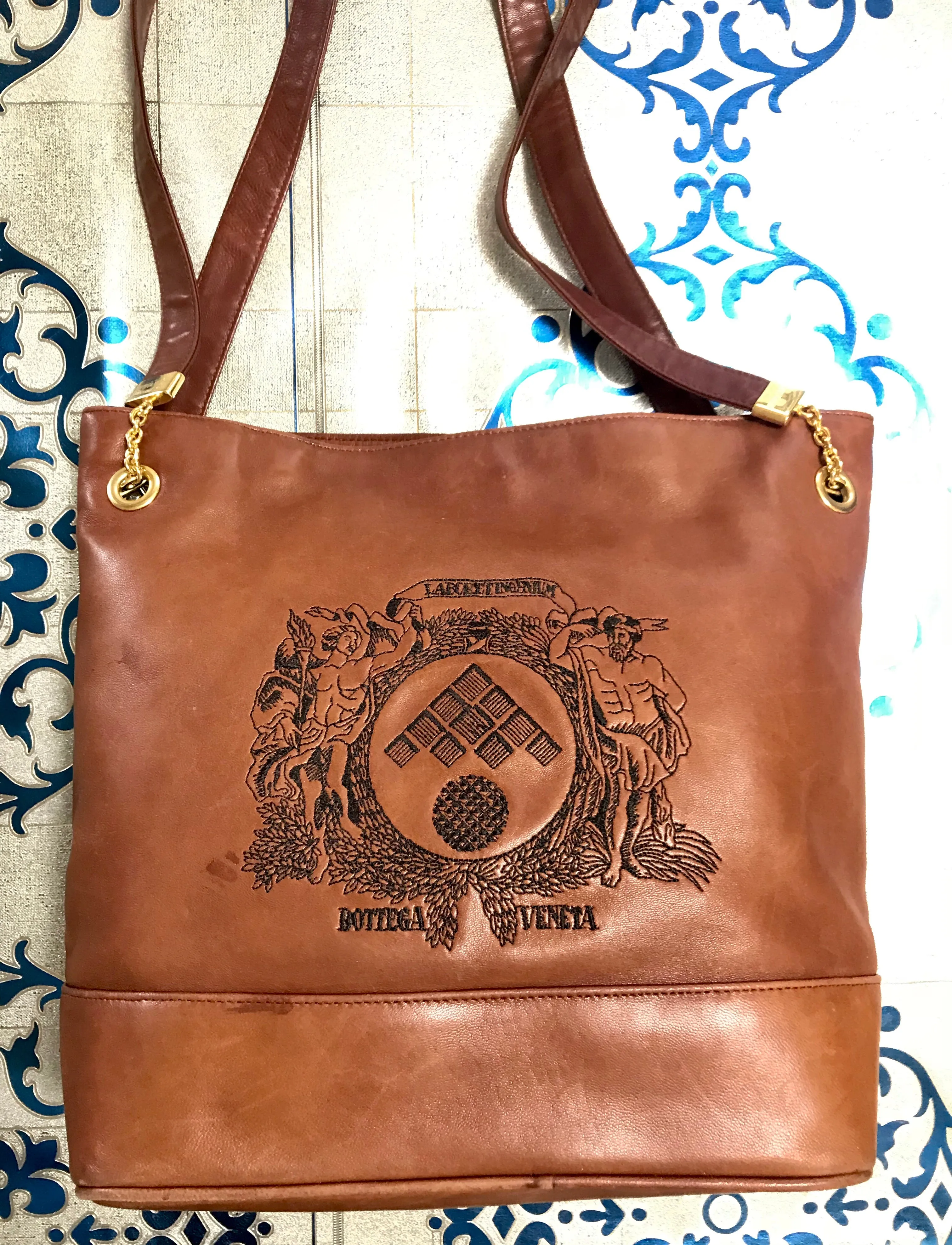 1990s. Vintage Bottega Veneta brown leather shoulder tote bag with logo embroidery. Claissic daily use bag.