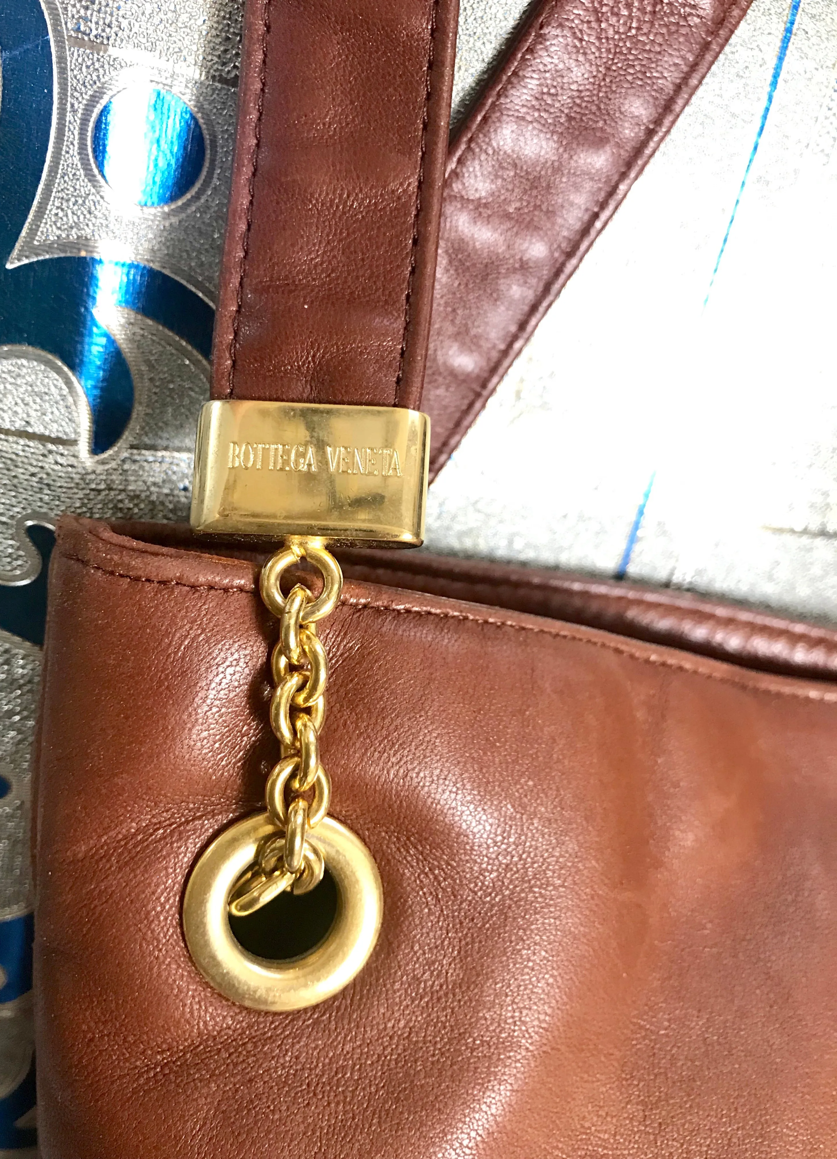 1990s. Vintage Bottega Veneta brown leather shoulder tote bag with logo embroidery. Claissic daily use bag.