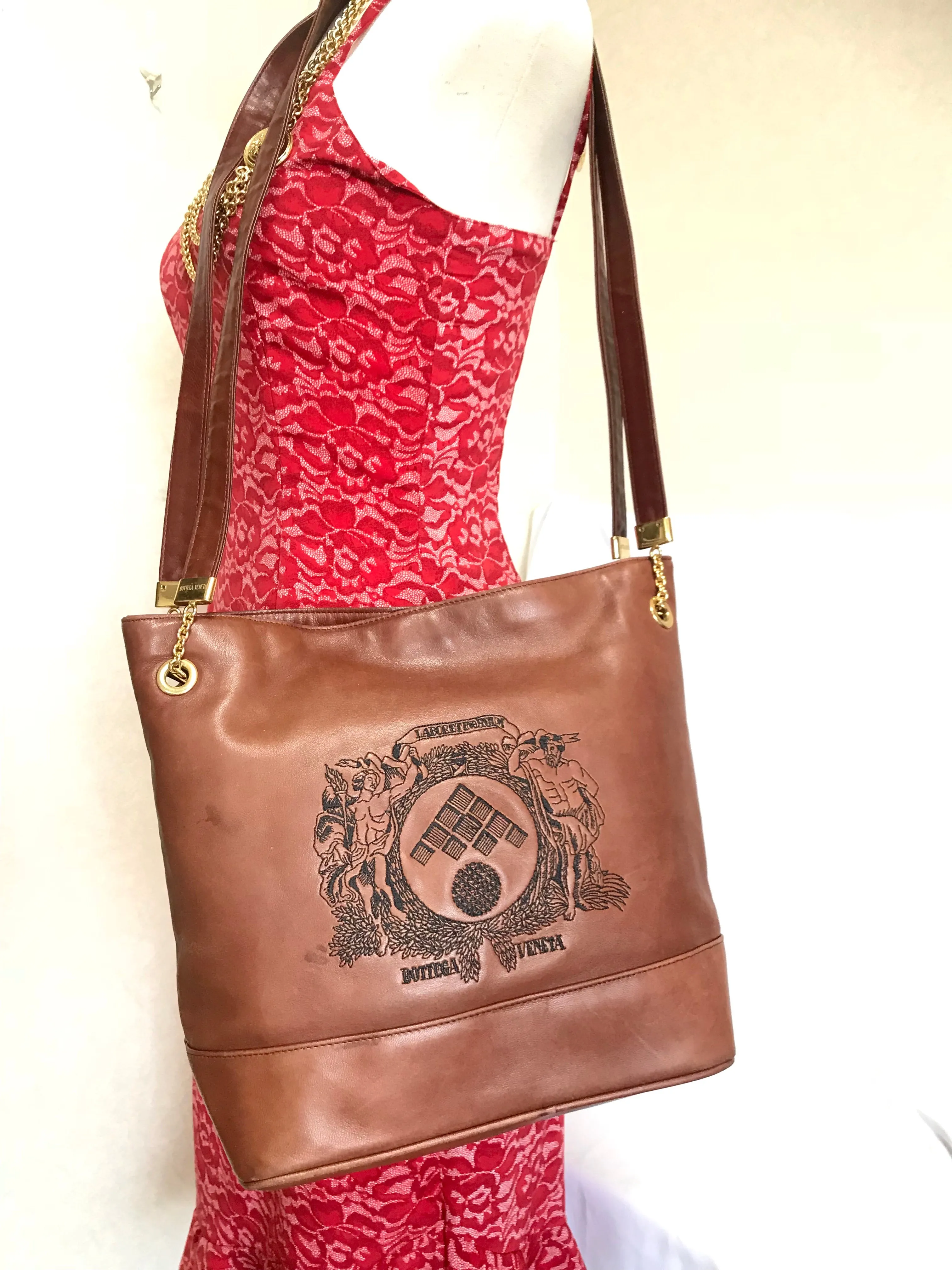 1990s. Vintage Bottega Veneta brown leather shoulder tote bag with logo embroidery. Claissic daily use bag.