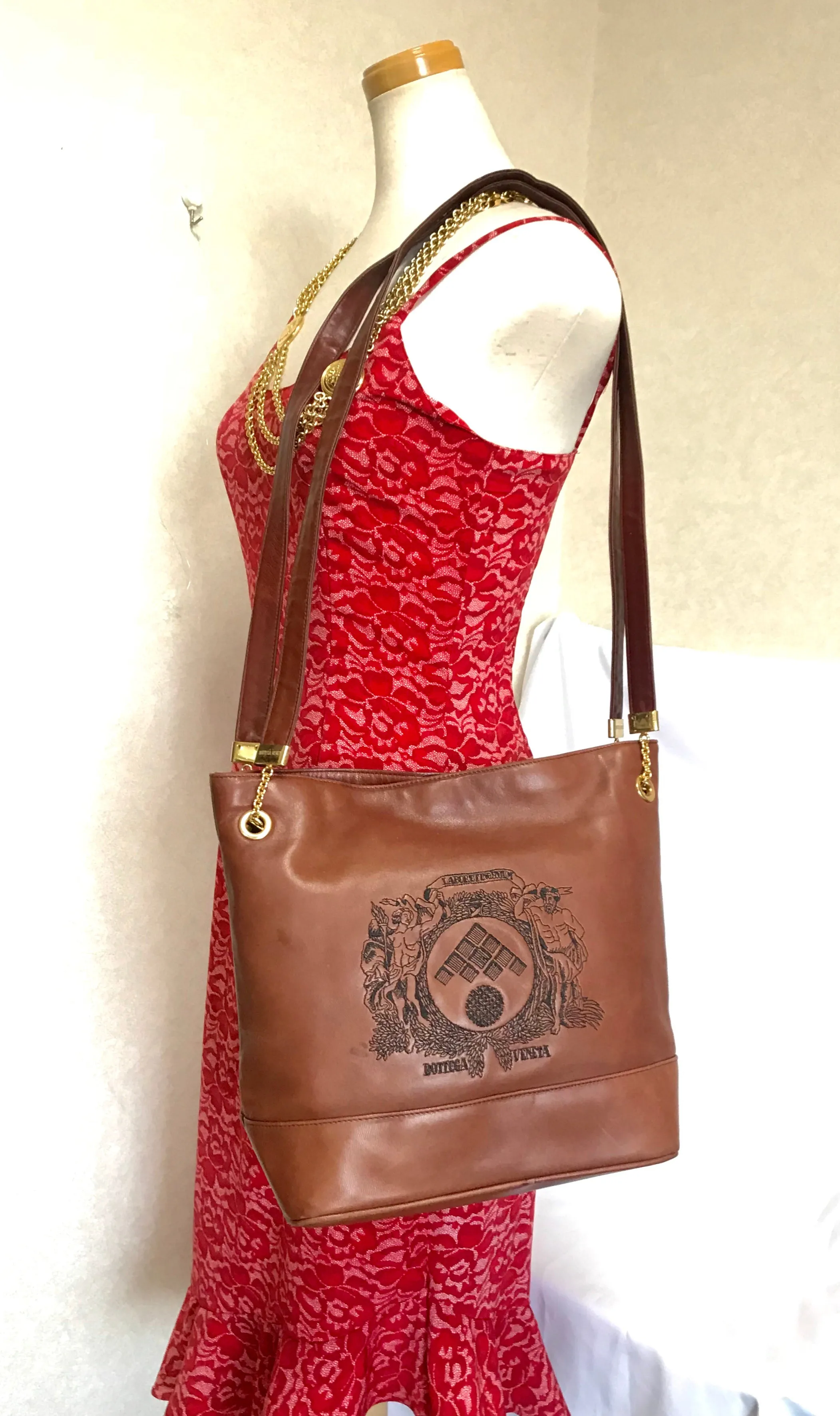 1990s. Vintage Bottega Veneta brown leather shoulder tote bag with logo embroidery. Claissic daily use bag.