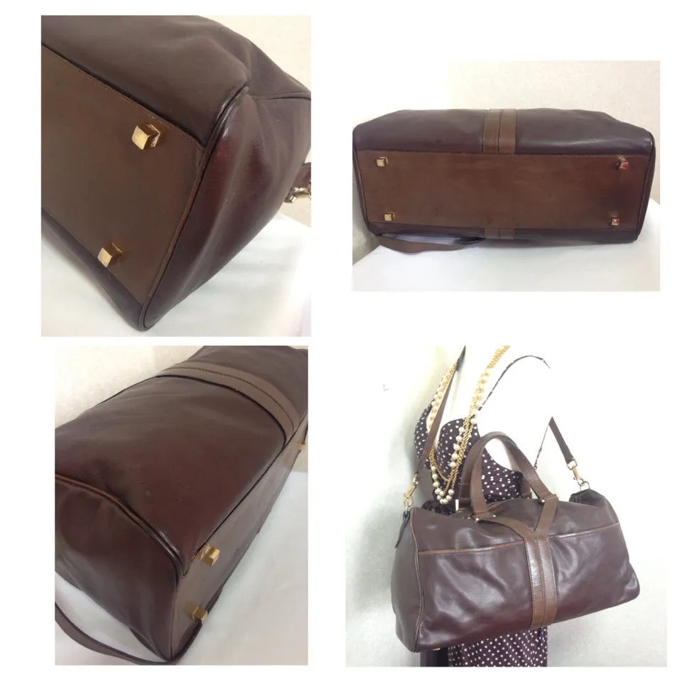 70's, 80's vintage Yves Saint Laurent genuine dark brown leather travel and daily use duffle bag. Classic unisex style YSL purse