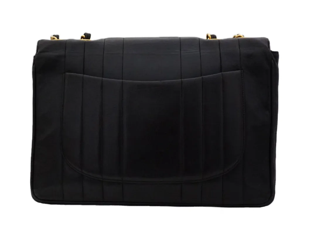 Authentic Chanel Vintage Black Lambskin Vertical Quilted Jumbo