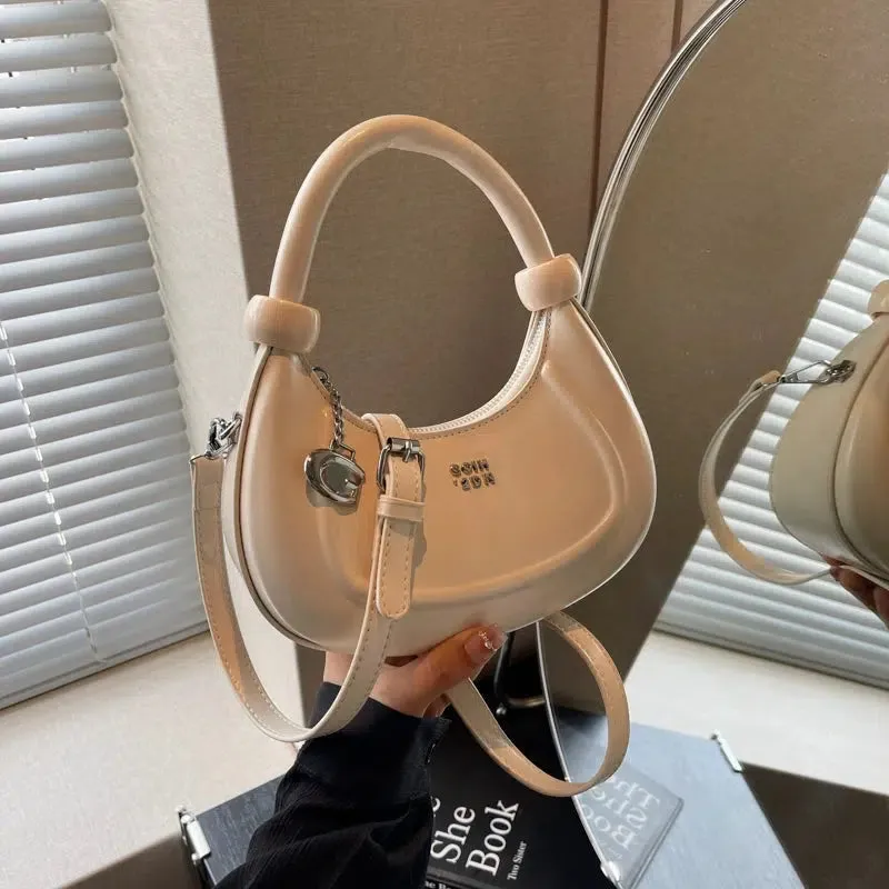 Embossed Logo Charm Shoulder Bag