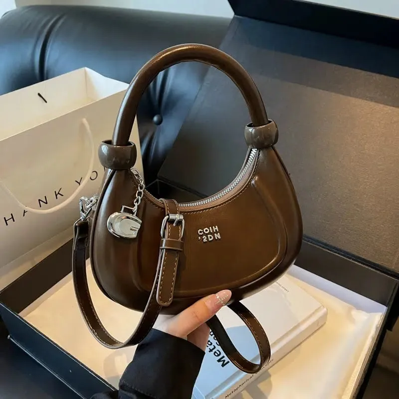 Embossed Logo Charm Shoulder Bag