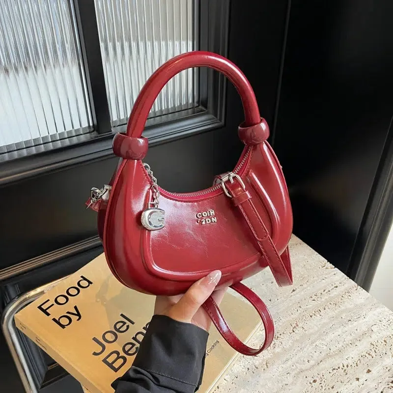 Embossed Logo Charm Shoulder Bag