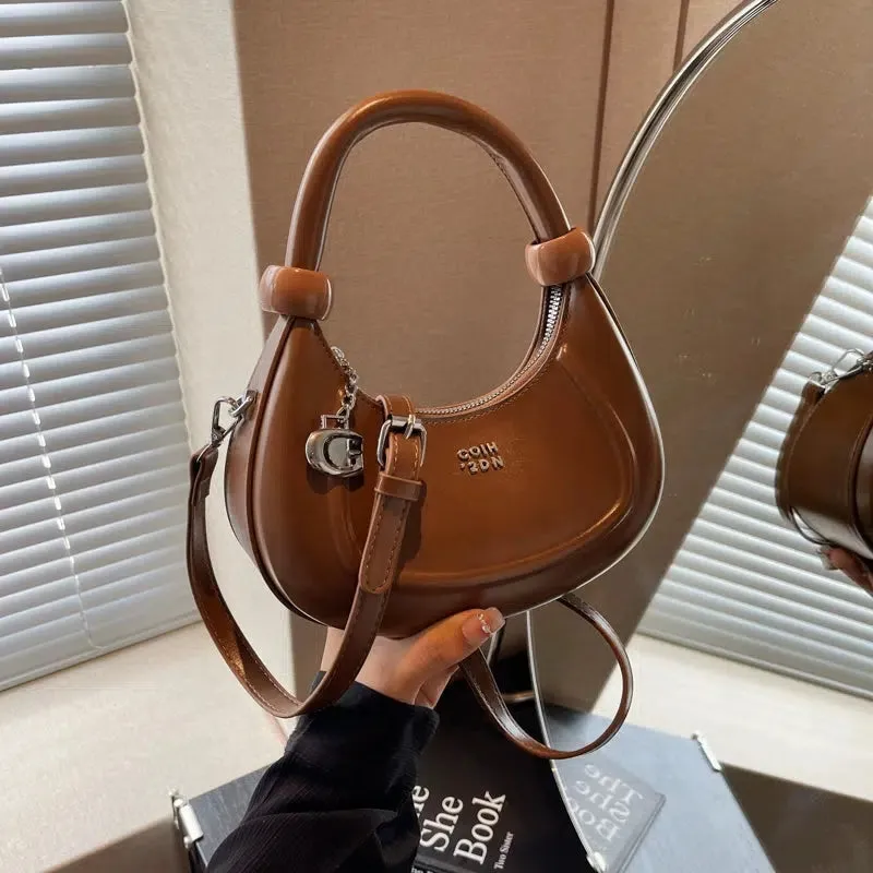 Embossed Logo Charm Shoulder Bag