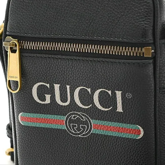Gucci Logo Print Leather Crossbody Bag in Black