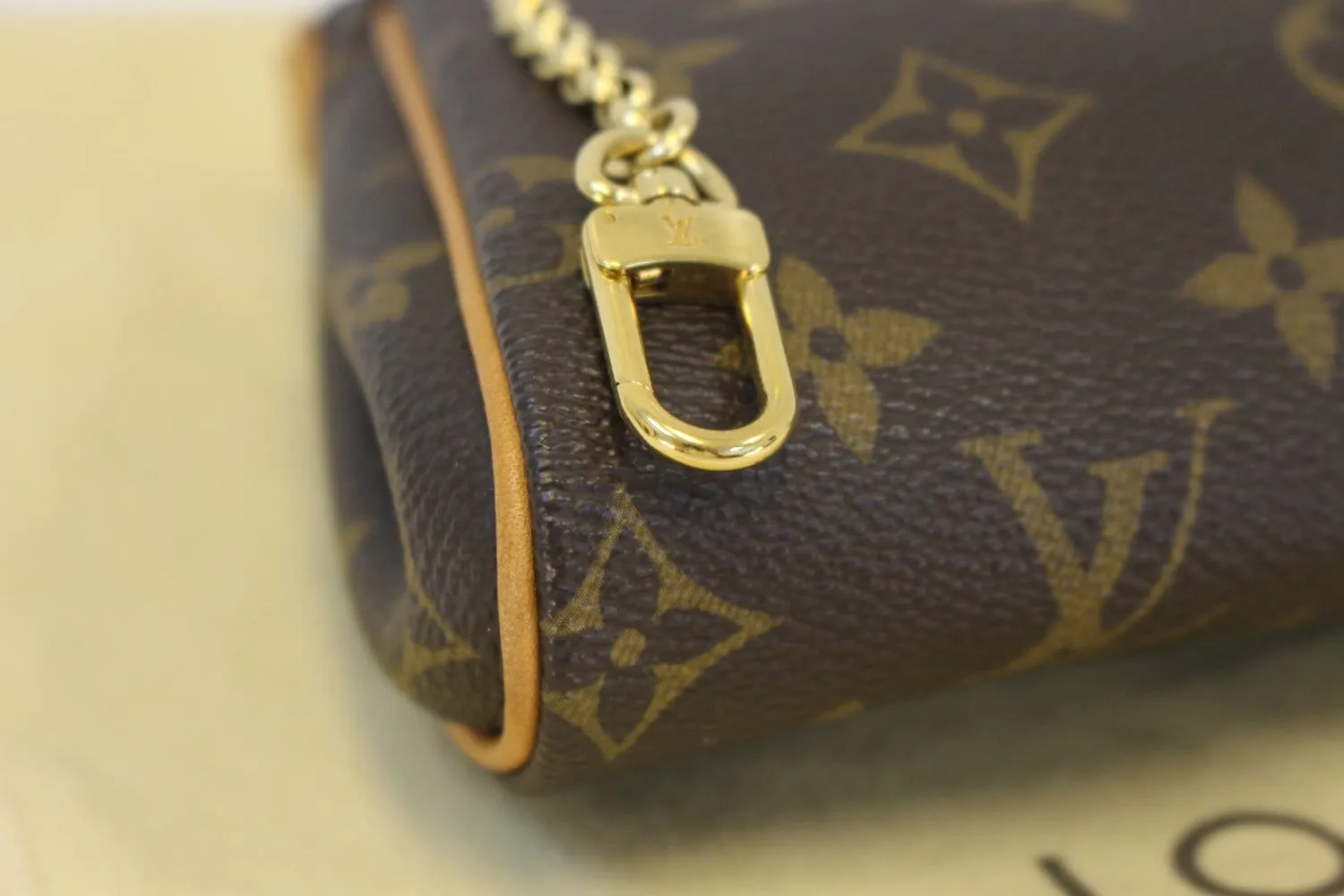 LOUIS VUITTON Monogram Canvas Eva Clutch Bag