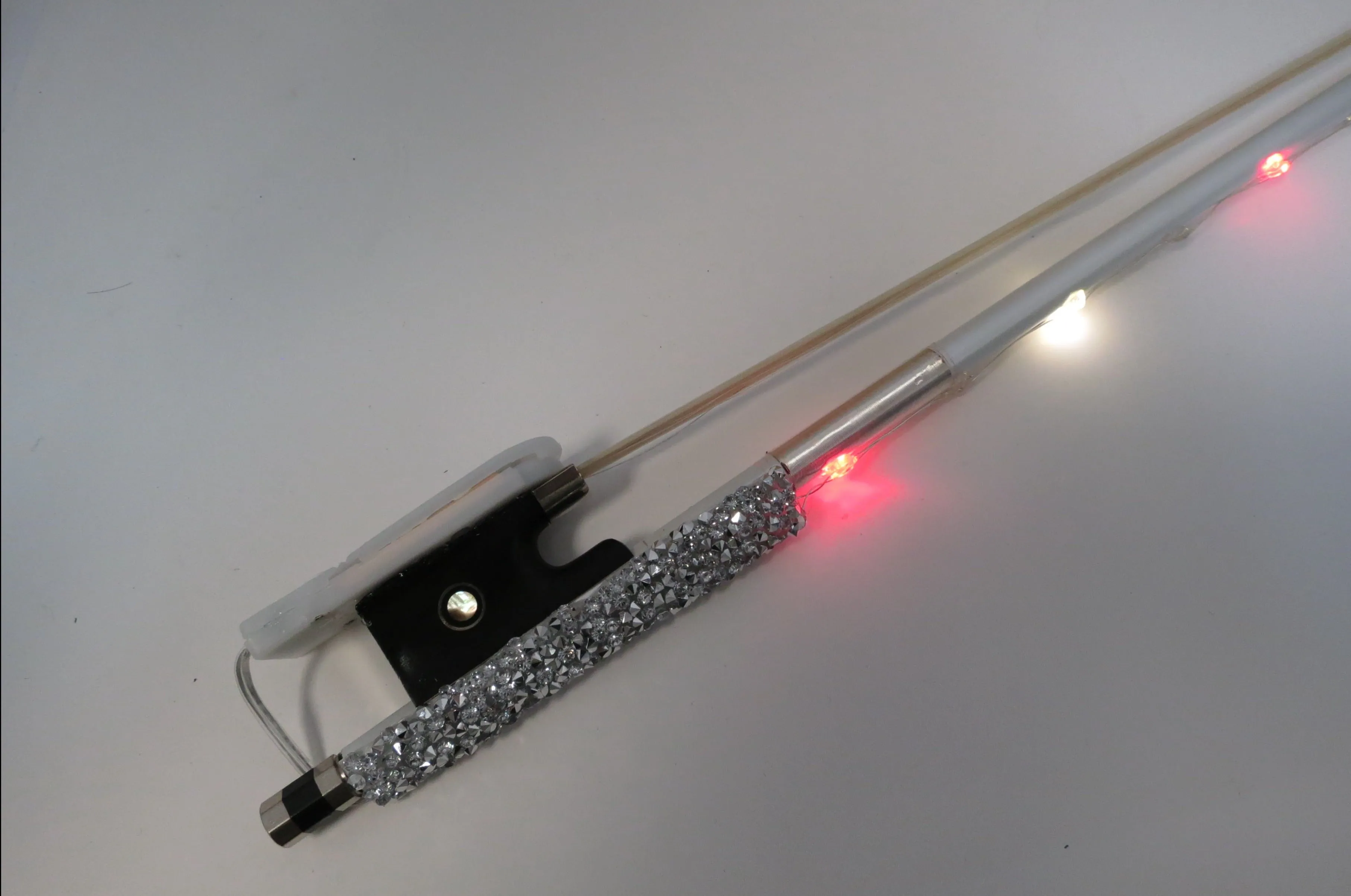 Rozanna's Violins Glow Bow Multi Color White Carbon Fiber Violin Bow