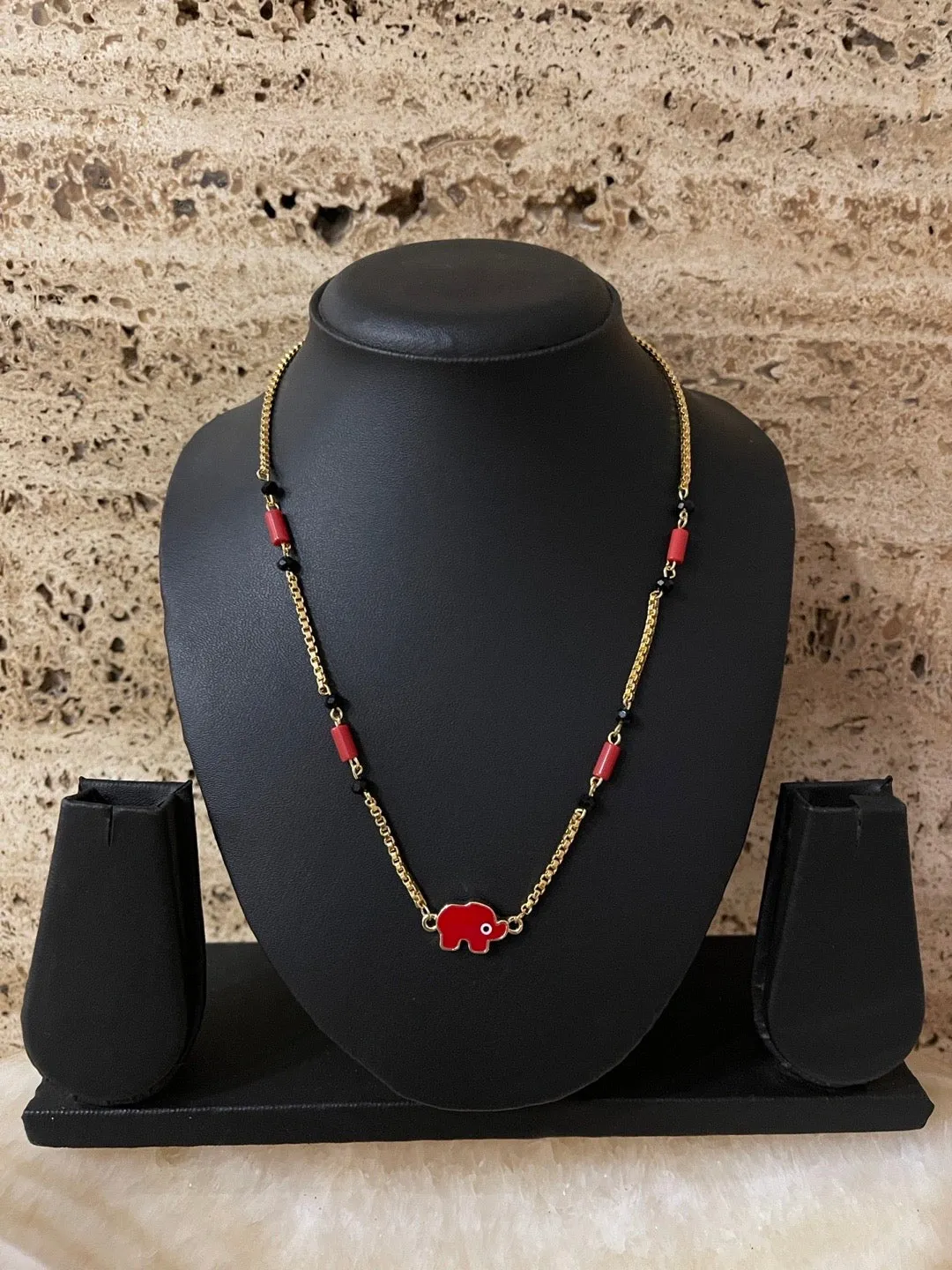 Simple Trendy Short Mangalsutra Designs Elephant Evil Eye Pendant Red & Black Beads Gold Chain
