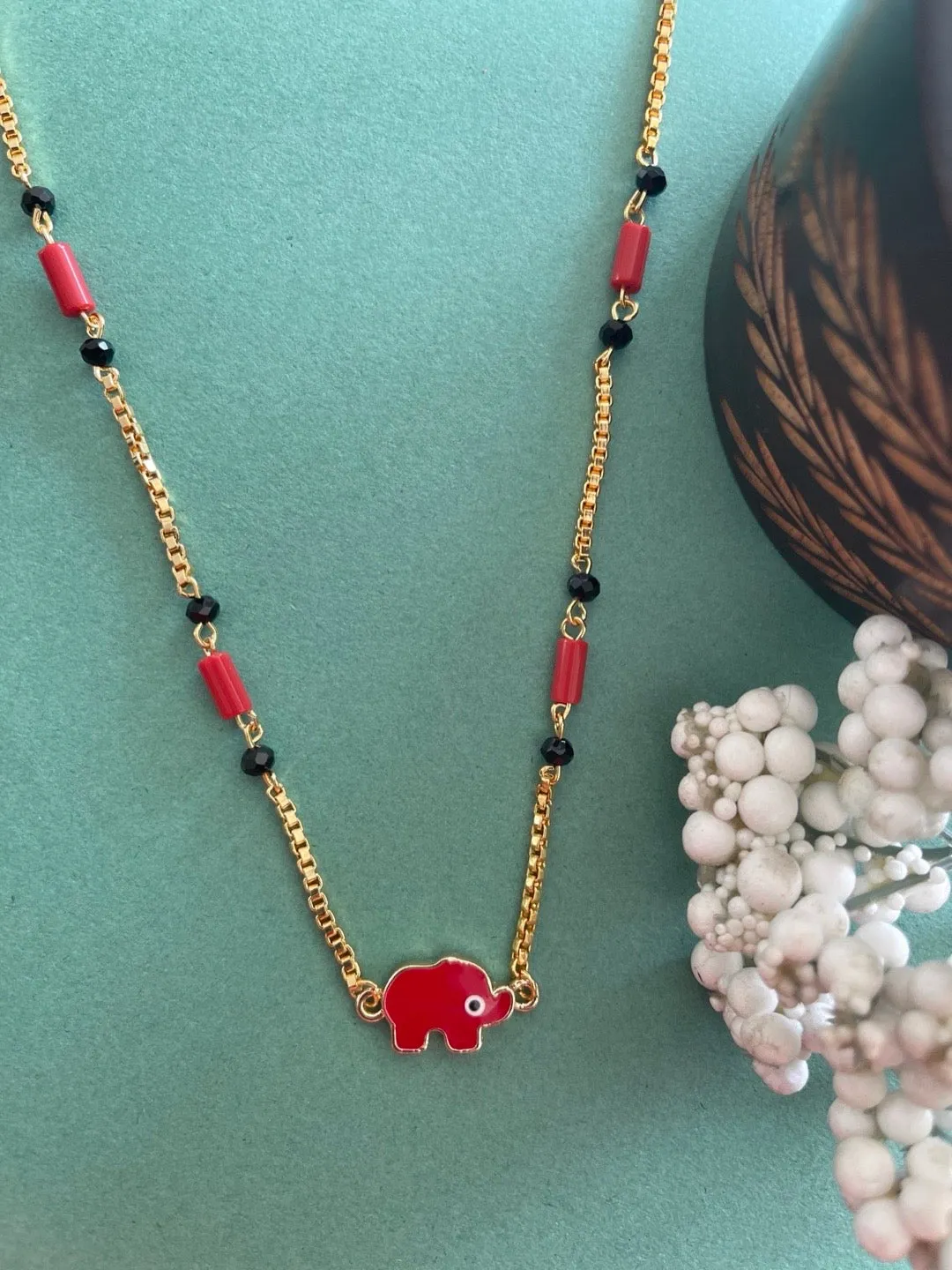 Simple Trendy Short Mangalsutra Designs Elephant Evil Eye Pendant Red & Black Beads Gold Chain