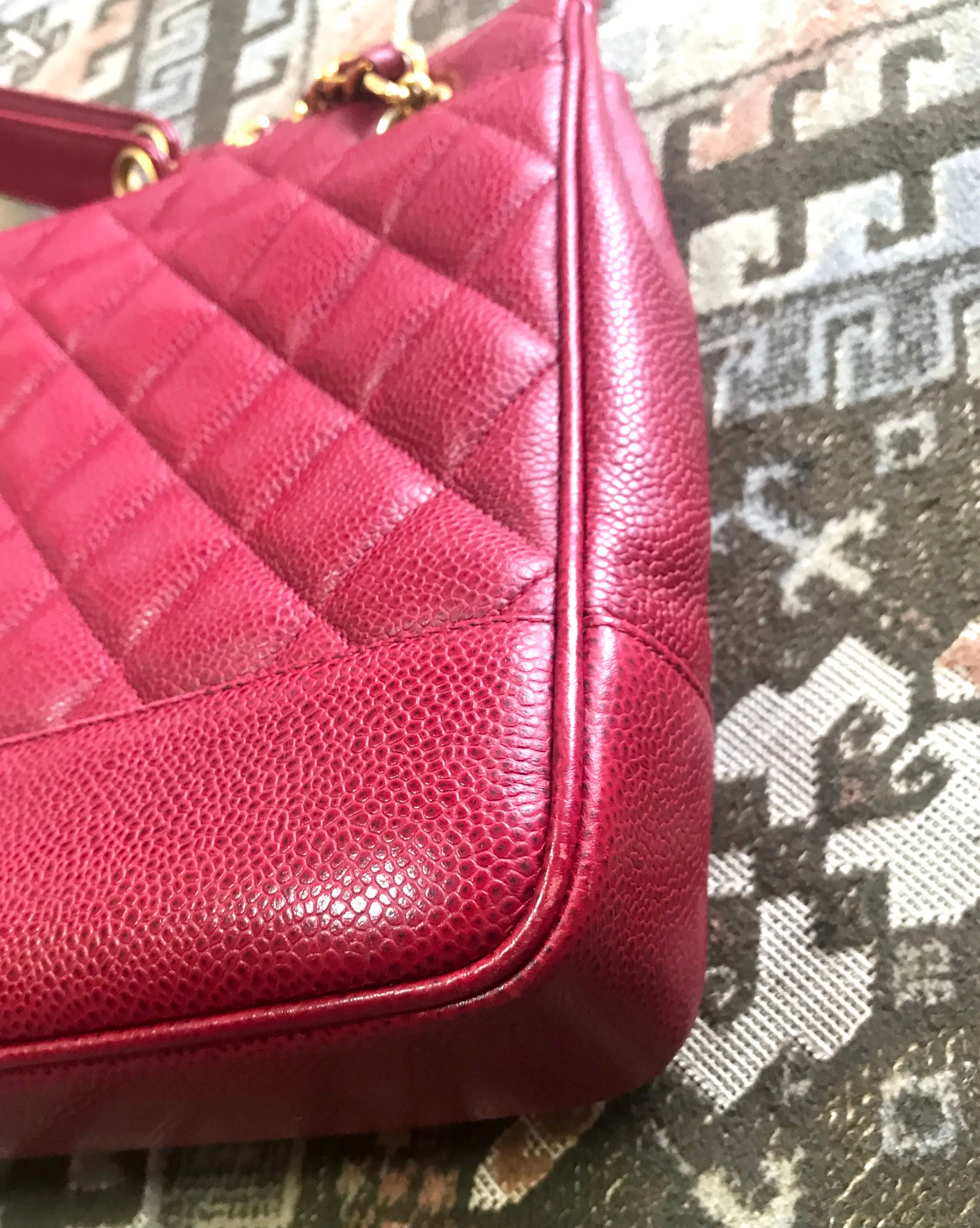 Vintage CHANEL cherry red caviar leather quilted shoulder bag, tote with golden CC ball and chain straps. Classic bag.