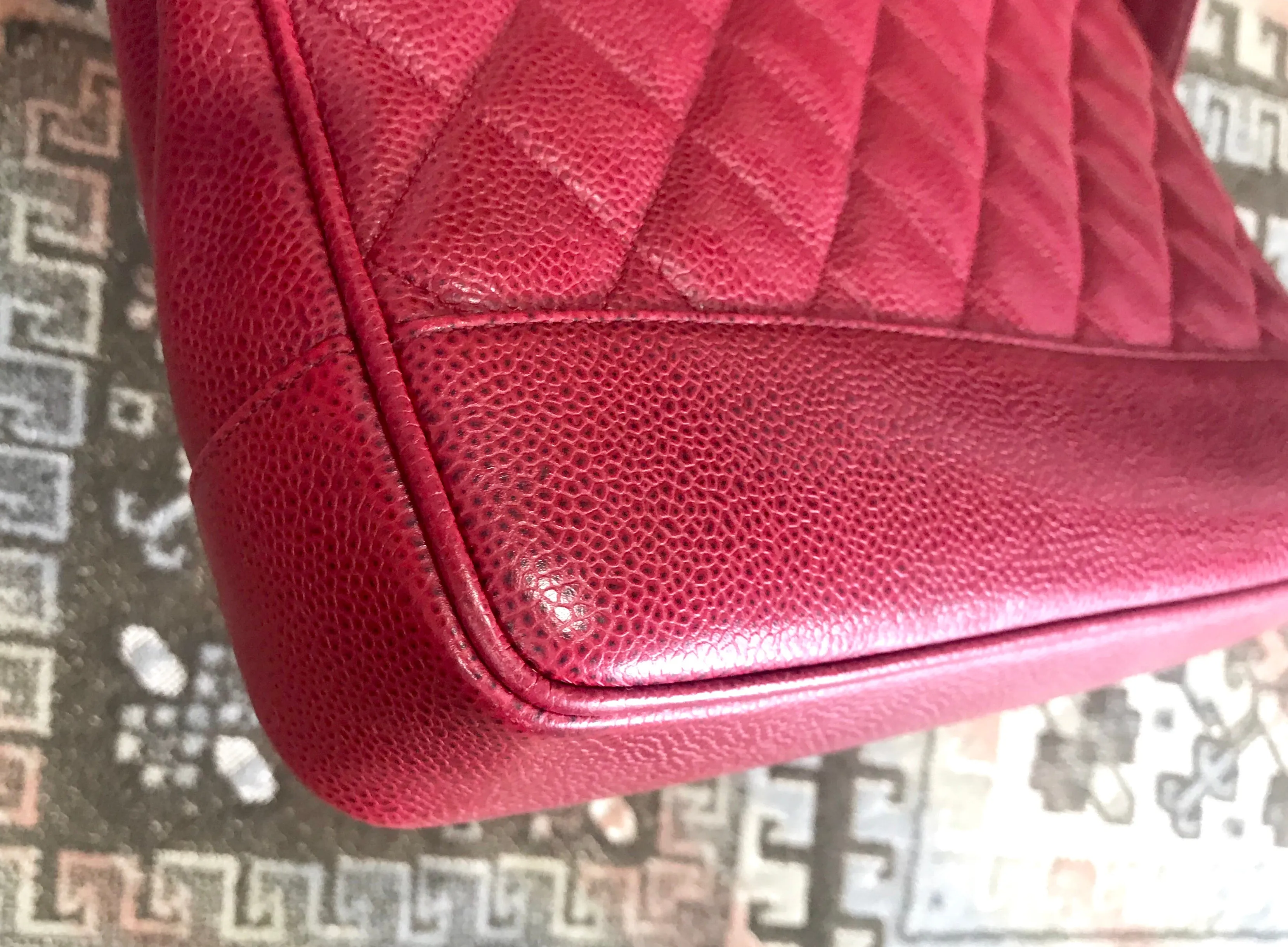 Vintage CHANEL cherry red caviar leather quilted shoulder bag, tote with golden CC ball and chain straps. Classic bag.
