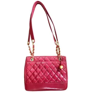 Vintage CHANEL cherry red caviar leather quilted shoulder bag, tote with golden CC ball and chain straps. Classic bag.