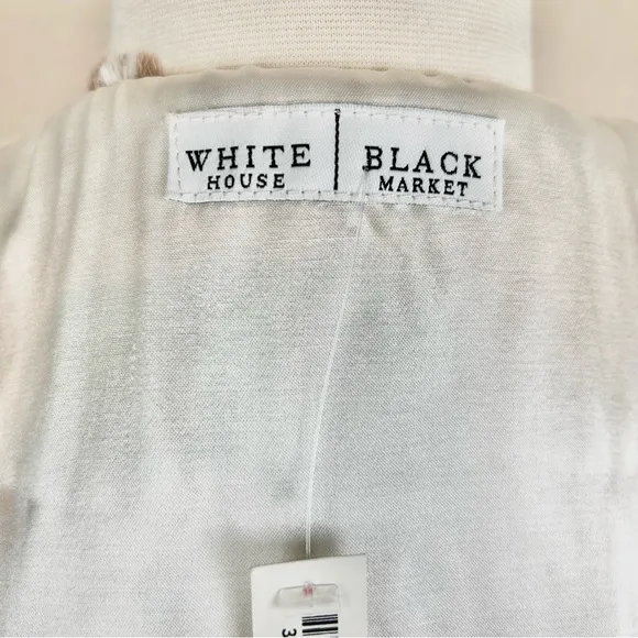 White House Black Market Snow Leopard Sleeveless Fur Zip Vest