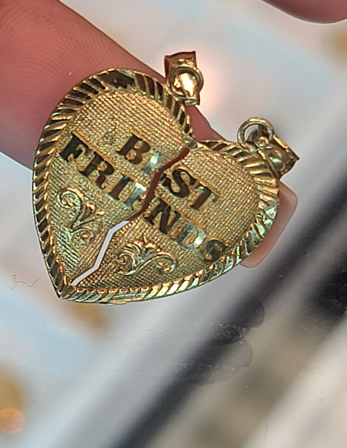 Yellow Gold Heart Pendant With The Words Best Friends